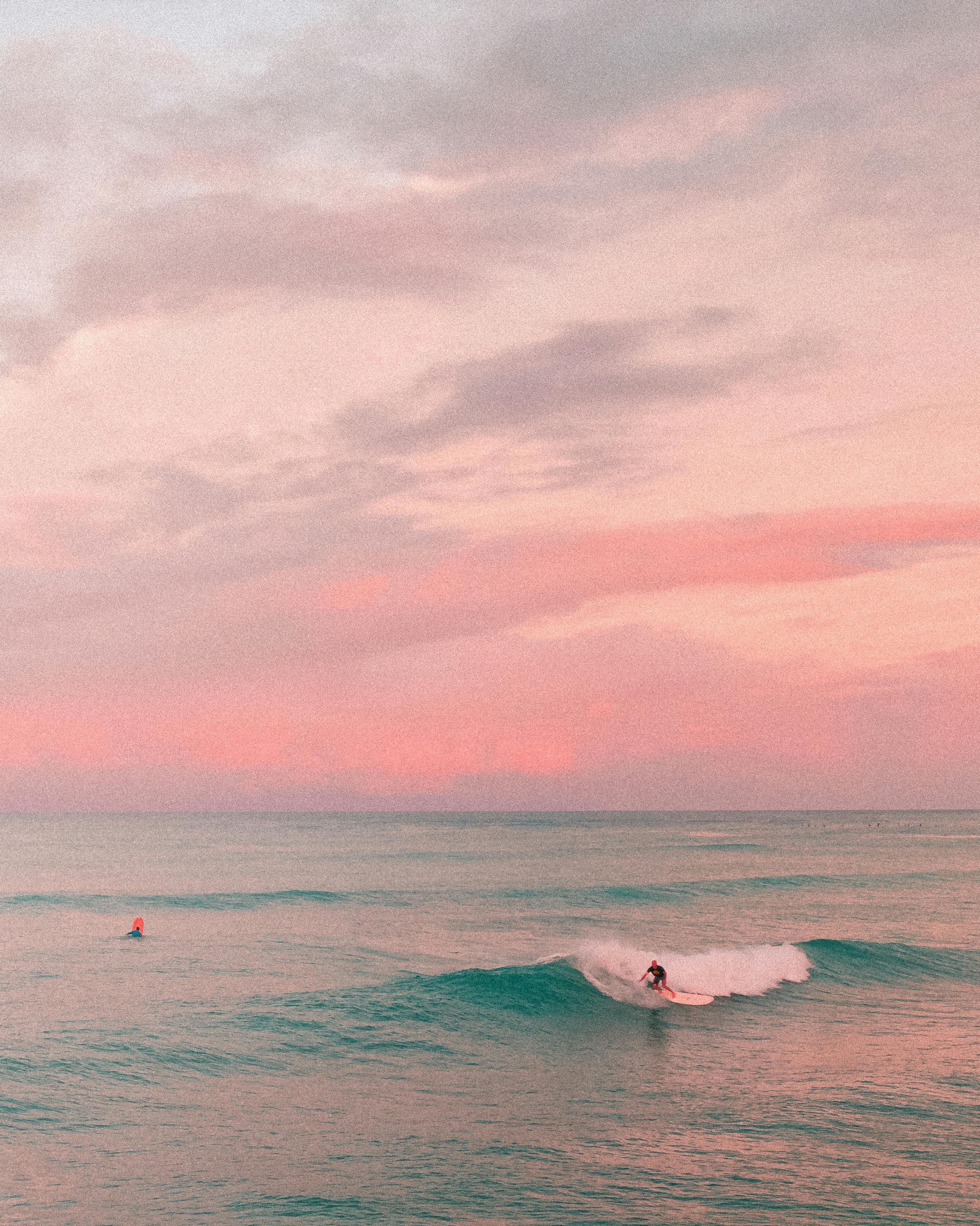 Surfer at sunset